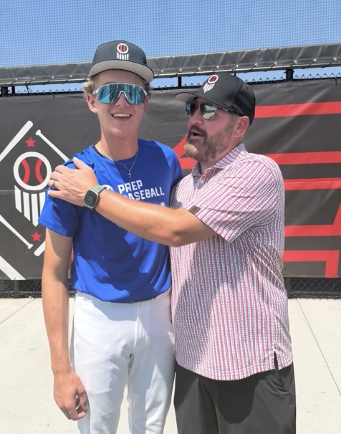 Sharing a moment together at a Prep Baseball event.